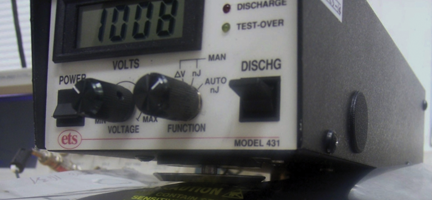 Figure 3: Current induced in a 30 m long ICT circuit by a typical 30 kA 5.5/75 stroke 30 m away, and the resulting energy in RC